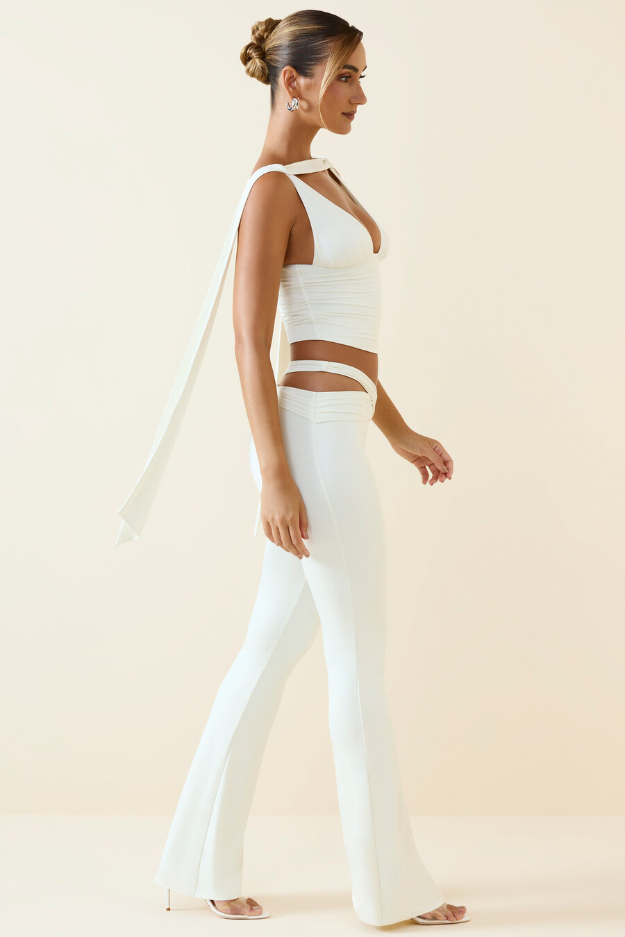 petite cut-out mid-rise flared trousers in vanilla