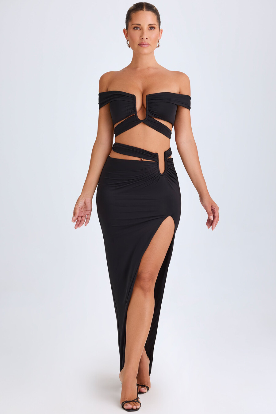 asymmetrische maxi-rok met uitsnijdingen in zwart