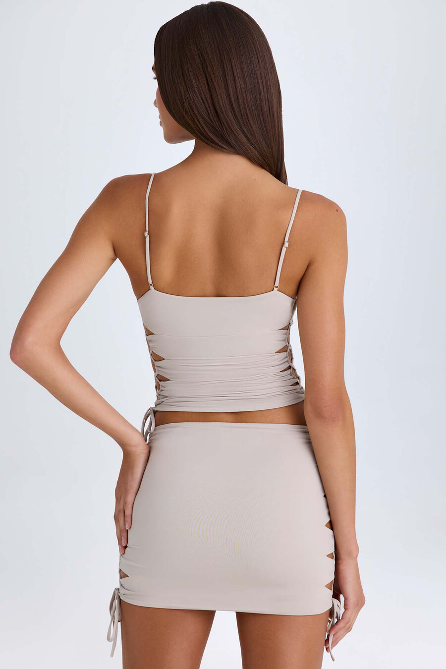 geplooide minirok met uitsnijdingen in taupe