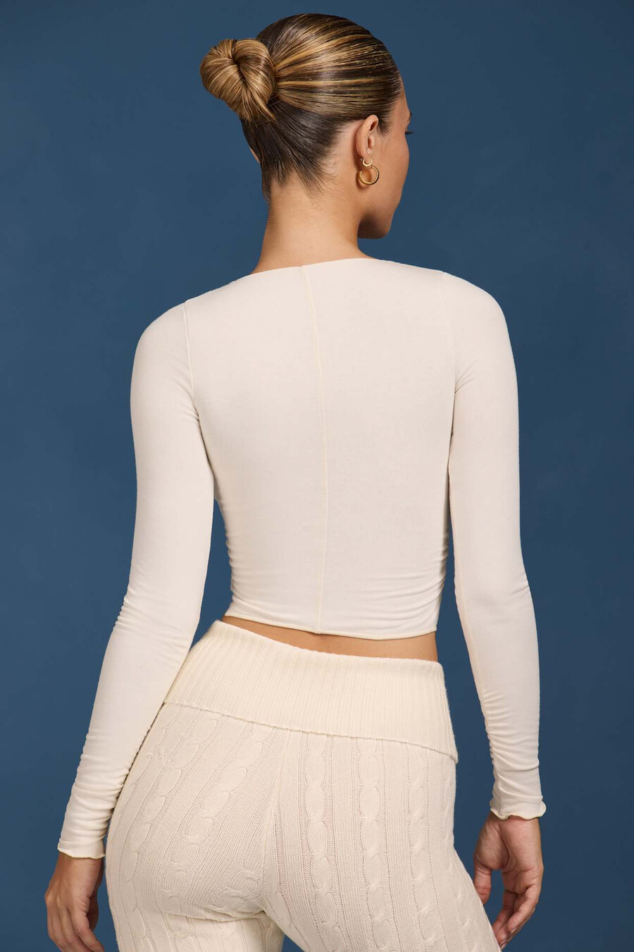 geplooide crop top met lange mouwen in crèmekleur