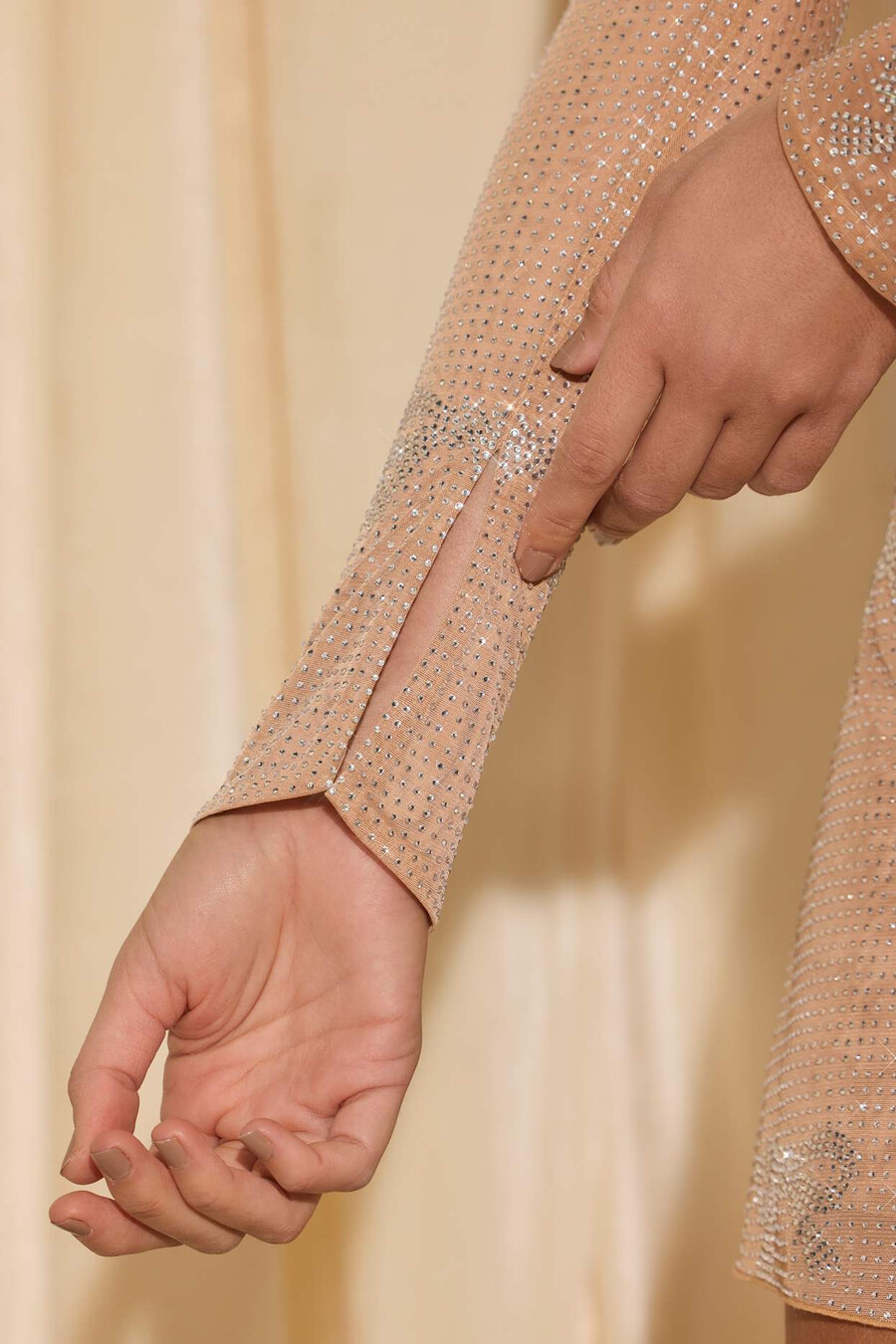 versierde top met strikdetail in amandelkleur