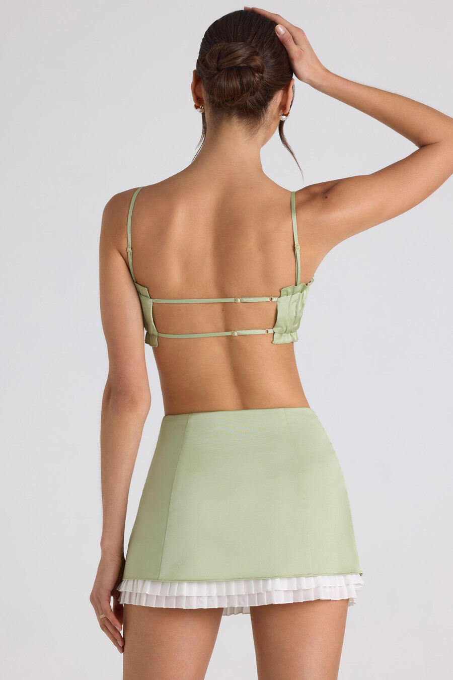 crop top met ruches en smockwerk in lentegroen