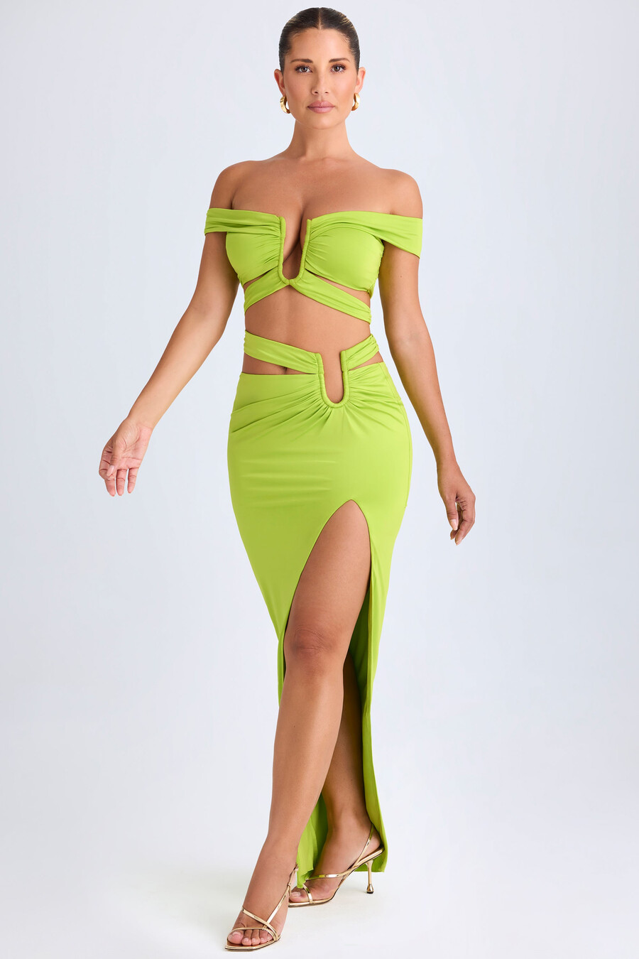 crop top met uitsnijdingen en blote schouders in limoengroen