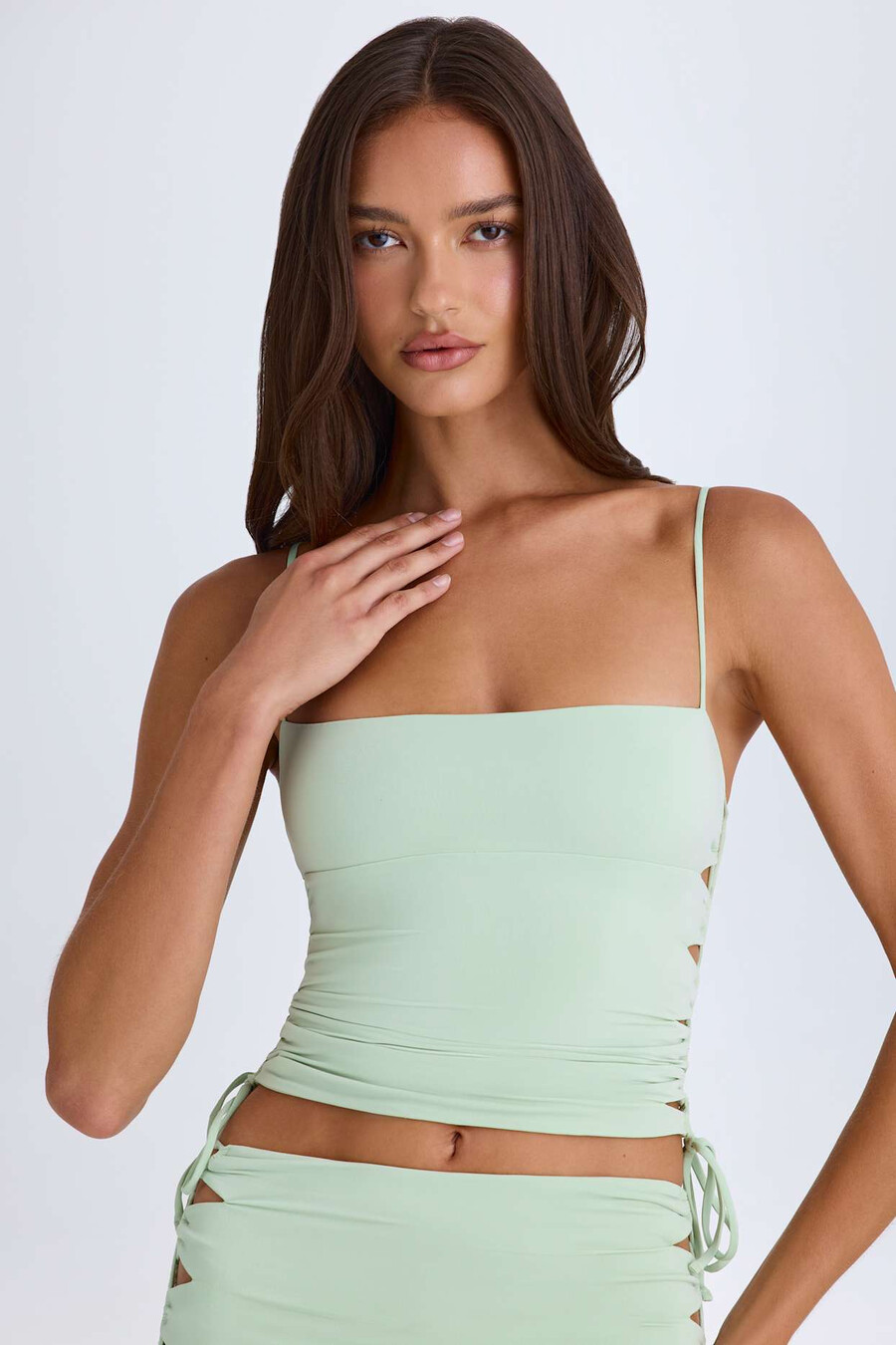 geplooide top met uitsnijdingen in groen
