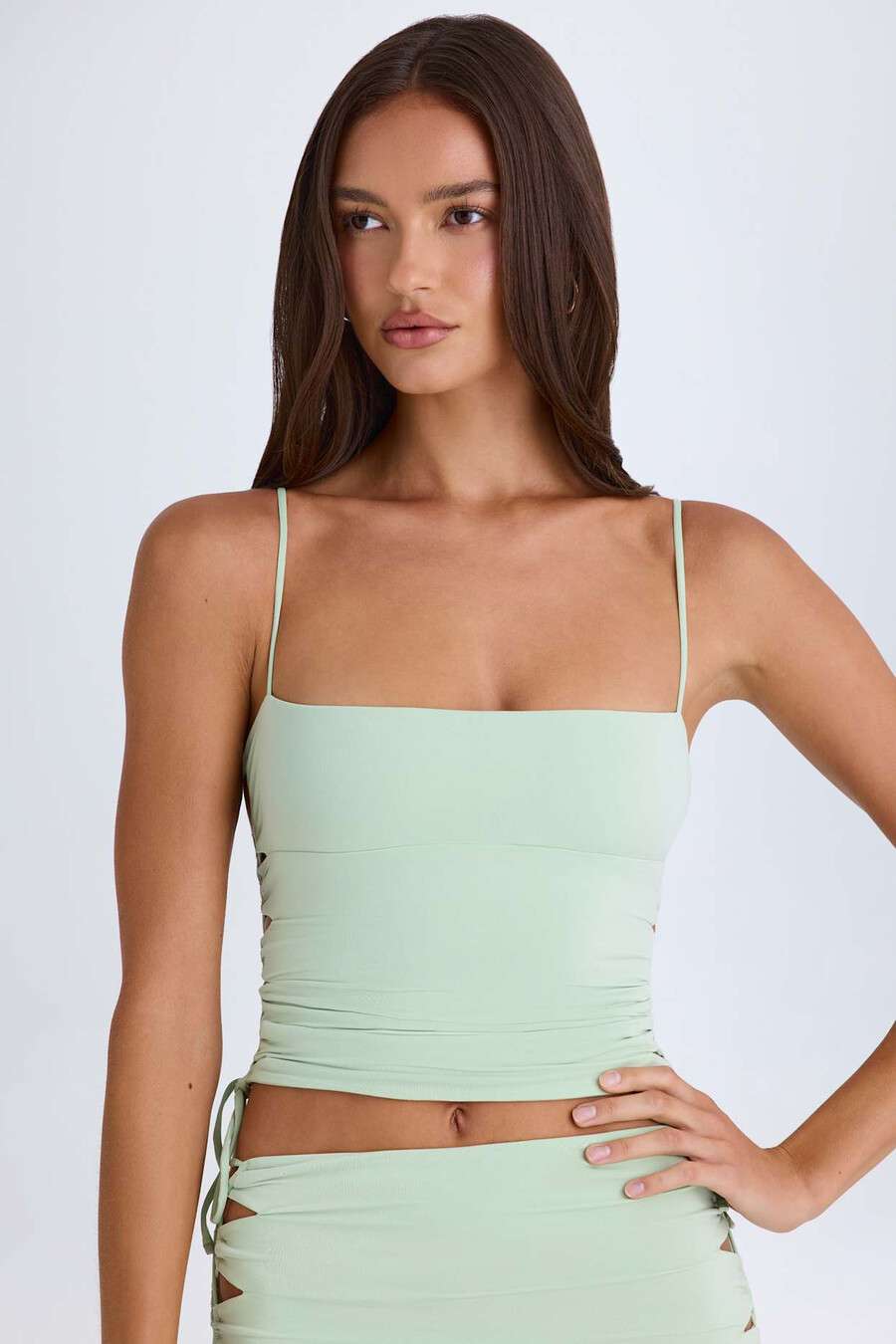 geplooide top met uitsnijdingen in groen