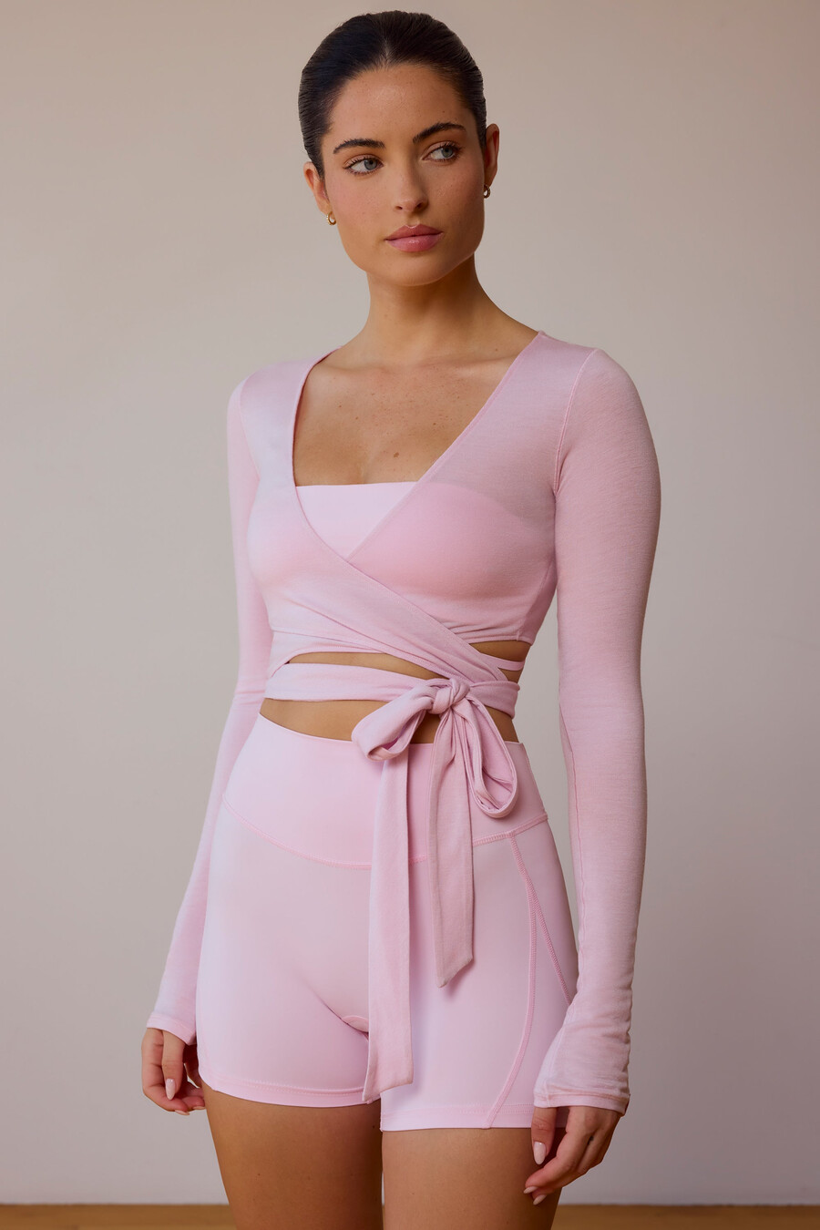 crop top met lange mouwen en wikkeldetail in zachtroze
