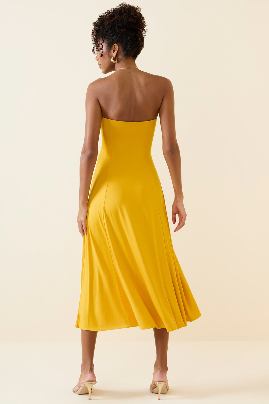 bandeau midaxijurk in goudgeel